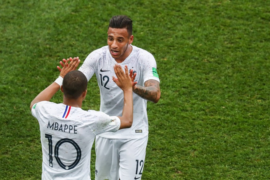 NIZHNY NOVGOROD, RUSSIA - JULY 6, 2018: France s Kylian Mbappe (L) and Corentin Tolisso celebrate their victory in the 2018 FIFA World Cup WM Weltmeisterschaft Fussball Quarterfinal football match aga ...