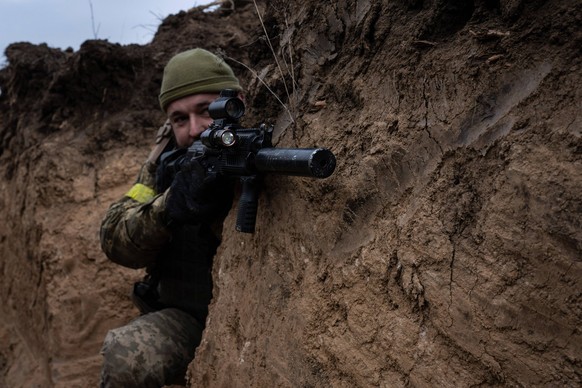 November 9, 2022, Mykolaiv, Ukraine: A Ukrainian soldier from the 63 brigade seen having military training simulating an attack in the trenches for the counteroffensive to recapture Kherson. The train ...