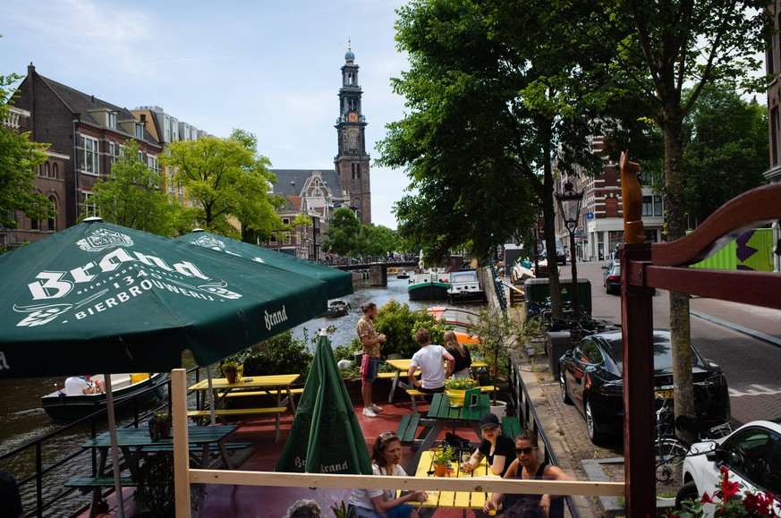 NETHERLANDS - HEALTH - COVID19 Cafe P96 has set up tables on a boat in the nearby canal as outdoor seating. Restaurants reopen in the Netherlands Monday, June 1st for outdoor seating and limited indoo ...