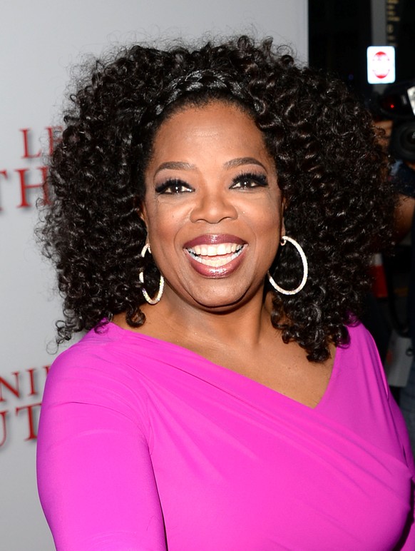 LOS ANGELES, CA - AUGUST 12: Oprah Winfrey arrives at the premiere of The Weinstein Company's &quot;Lee Daniels' The Butler&quot; at Regal Cinemas L.A. Live on August 12, 2013 in Los Angeles, Californ ...
