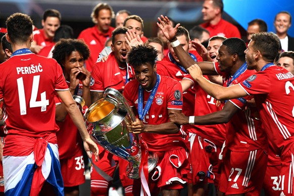 FOOTBALL : Paris Saint Germain vs Bayern Munich - Finale - UEFA Ligue des Champions - 23/08/2020 LISBON, PORTUGAL - AUGUST 23: Kingsley Coman of FC Bayern Munich celebrates with the UEFA Champions Lea ...