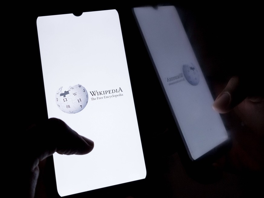 Logo Photo Illustration The Wikipedia logo displays on a smartphone screen in Athens, Greece, on September 23, 2024. Photo illustration by Nikolas Kokovlis/NurPhoto Athens Greece PUBLICATIONxNOTxINxFR ...