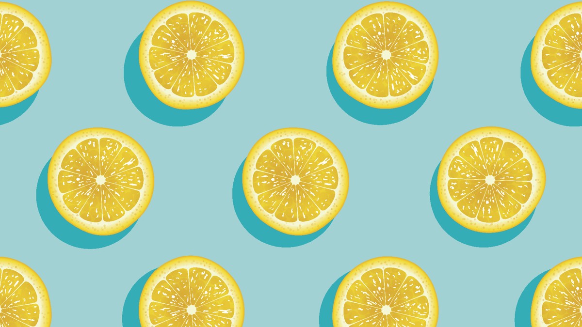 Slices of fresh yellow lemon summer background.