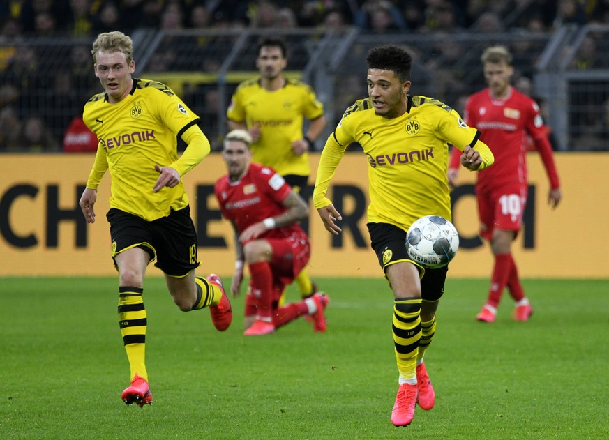 Julian Brandt (l.) und Jadon Sancho stehen derzeit im Schatten von Neu-Star Erling Haaland.