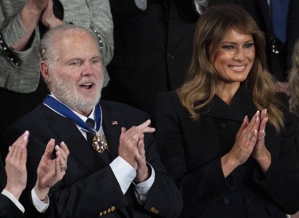 First Lady Melania Trump presents the Presidential Medal of Freedom to conservative commentator Rush Limbaugh L as President Donald Trump delivers his State of the Union address to a joint session of  ...