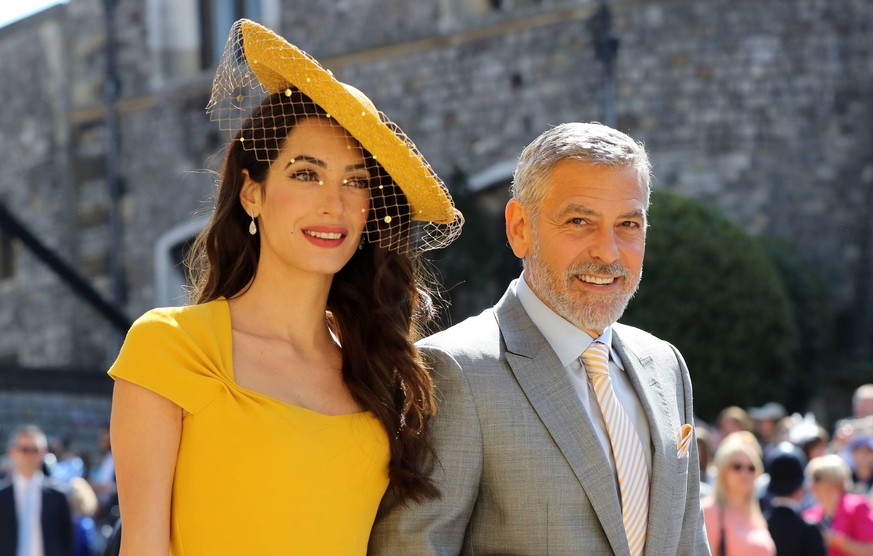 . 19/05/2018. Windsor, United Kingdom. George and Amal Clooney arriving at The Royal Wedding at Windsor Castle. PUBLICATIONxINxGERxSUIxAUTxHUNxONLY xi-Imagesx/xPoolx IIM-17781-0046