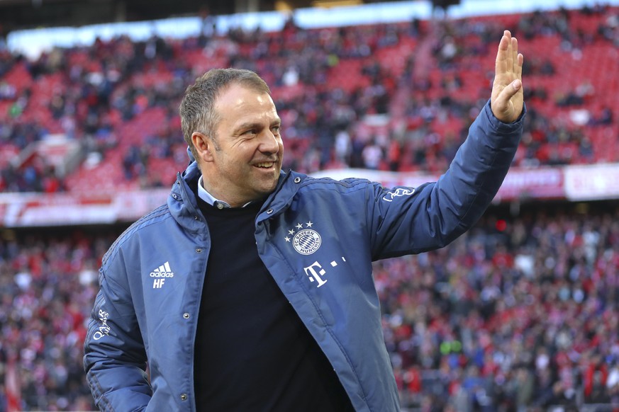 Bayern&#039;s interim head coach Hans-Dieter Flick arrives before the German Bundesliga soccer match between FC Bayern Munich and FC Augsburg in Munich, Germany, Sunday, March 8, 2020. (AP Photo/Matth ...