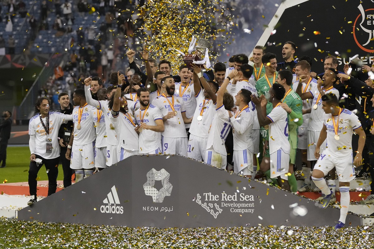 FILE - Real Madrid&#039;s payers celebrate after winning the Spanish Super Cup final soccer match between Real Madrid and Athletic Bilbao at King Fahd stadium in Riyadh, Saudi Arabia, Sunday, Jan. 16, ...