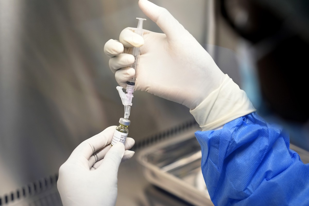 A pharmacist holds a vial of lenacapavir, the new HIV prevention injectable drug, at the Desmond Tutu Health Foundation&#039;s Masiphumelele Research Site, in Cape Town, South Africa, Tuesday, July 23 ...