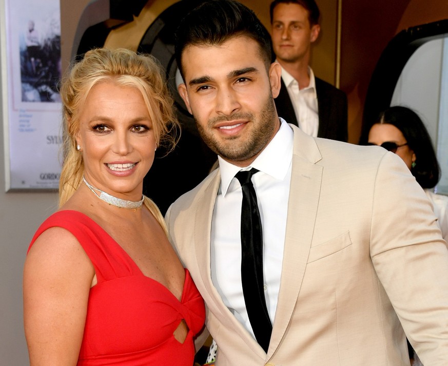 HOLLYWOOD, CALIFORNIA - JULY 22: Britney Spears (L) and Sam Asghari arrive at the premiere of Sony Pictures&#039; &quot;One Upon A Time...In Hollywood&quot; at the Chinese Theatre on July 22, 2019 in  ...