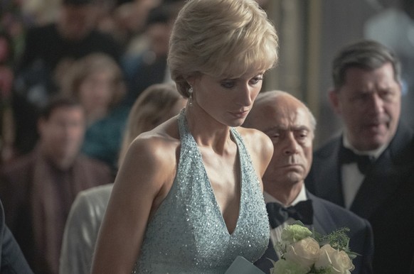This image released by Netflix shows Elizabeth Debicki as Diana, Princess of Wales, in a scene from &quot;The Crown.&quot; (Keith Bernstein/Netflix via AP)