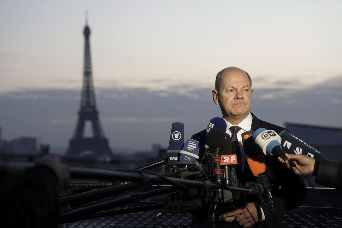 Germany&#039;s Chancellor Olaf Scholz speaks with the media at the German Embassy after an informal meeting of leaders from key European Union nations and the United Kingdom in Paris, Monday, Feb. 17, ...