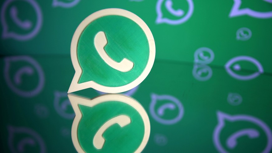 FILE PHOTO: A 3D printed Whatsapp logo is seen in front of a displayed Whatsapp logo in this illustration September 14, 2017. REUTERS/Dado Ruvic/File Photo