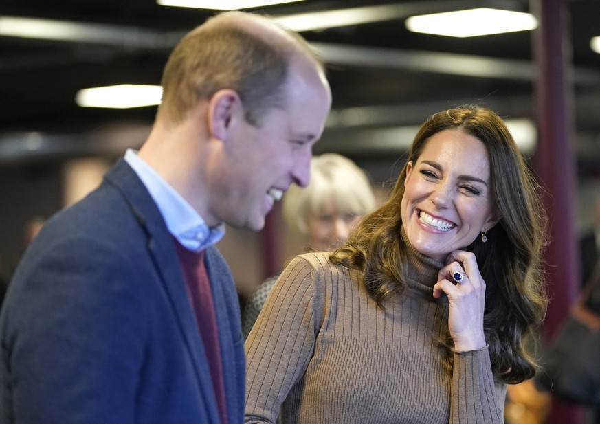 Britain's Prince William and Kate, Duchess of Cambridge during a visit to the Church on the Street in Burnley, England, Thursday, Jan. 20, 2022, where they are meeting with volunteers and staff to hea ...