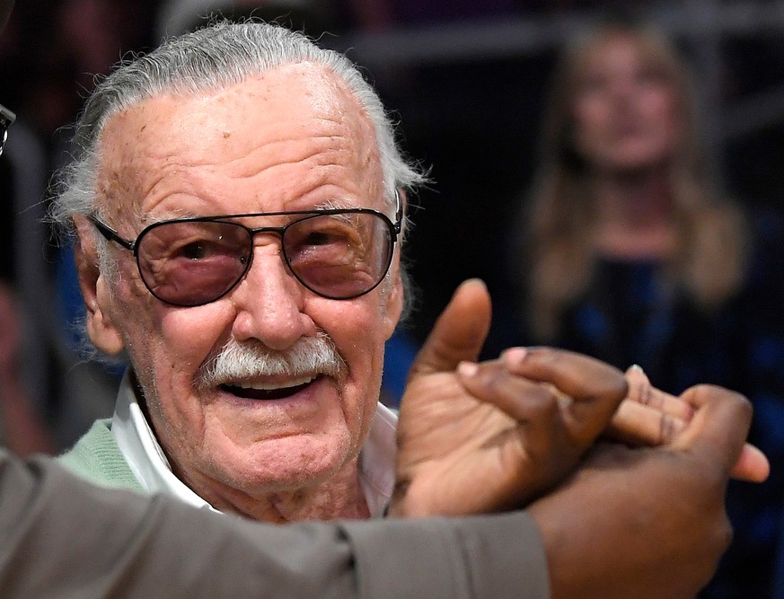 FILE - In this Oct. 27, 2017 file photo, famed comic book creator Stan Lee appears at an NBA basketball game between the Los Angeles Lakers and the Toronto Raptors, in Los Angeles. A Chicago masseuse  ...