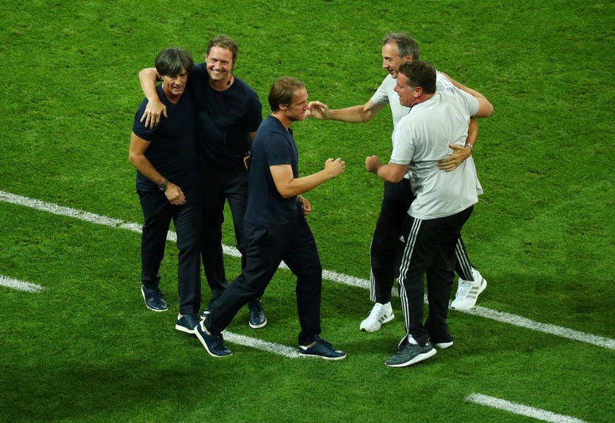 Soccer Football - World Cup - Group F - Germany vs Sweden - Fisht Stadium, Sochi, Russia - June 23, 2018 Germany coach Joachim Low and coaching staff celebrate after Toni Kroos scores their second goa ...