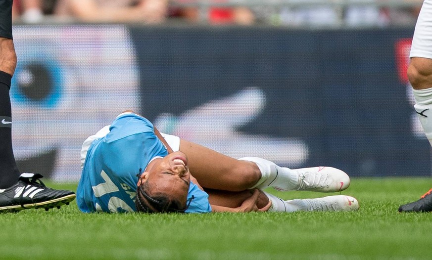 Leroy Sane of Man City injured tearing his cruciate ligament during the FA Community Shield match between Liverpool &amp; Manchester City at Wembley Stadium, London, England on 4 August 2019. PUBLICAT ...