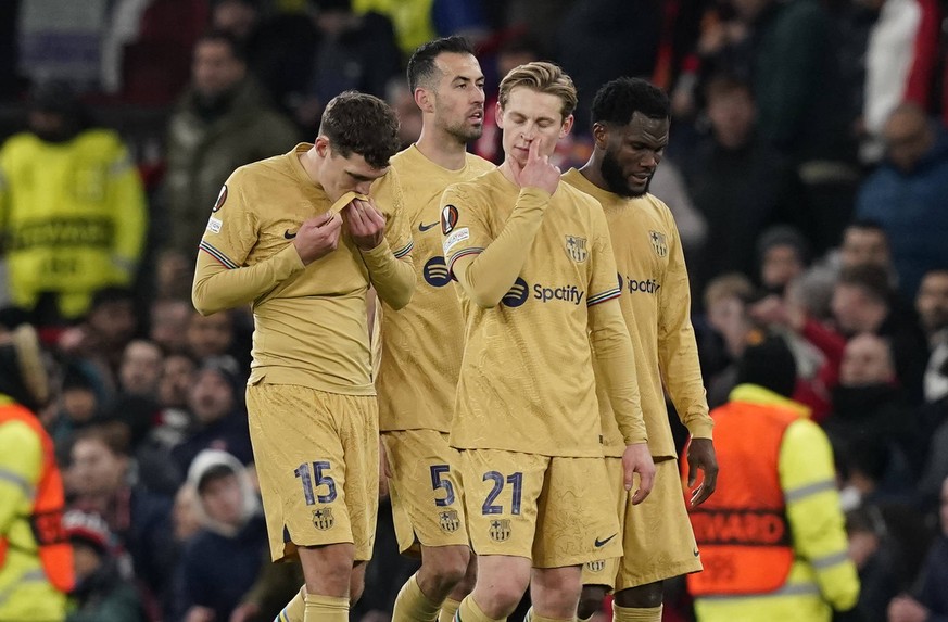 Manchester, England, 23rd February 2023. Andreas Christensen, Sergio Busquets, Frenkie de Jong and Ronald Araujo of Barcelona dejected during the UEFA Europa League match at Old Trafford, Manchester.  ...