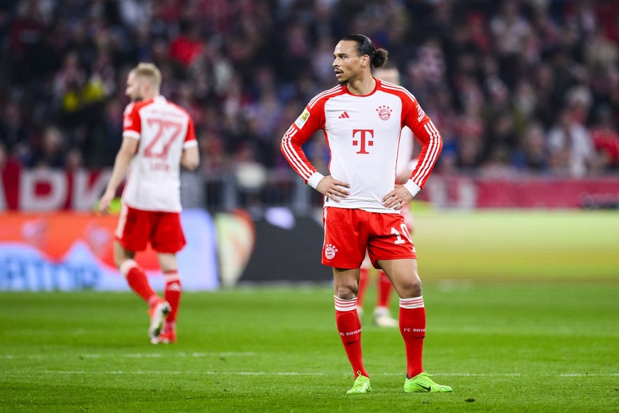 30.03.2024, Bayern, München: Fußball: Bundesliga, Bayern München - Borussia Dortmund, 27. Spieltag, Allianz Arena.  Leroy Sane (r) uit München reageert unzufrieden.  Foto: Tom Weller/dpa - WICHTIGER HINWEI ...