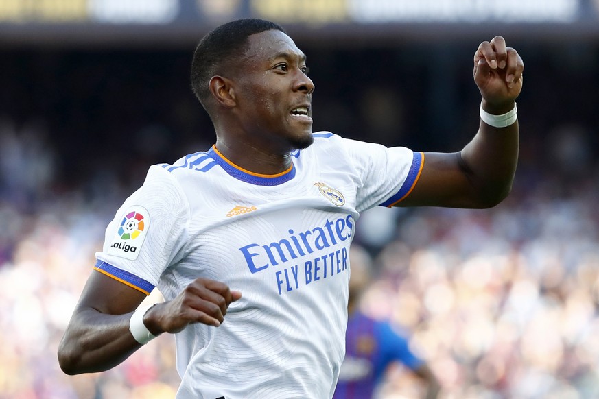 Real Madrid&#039;s David Alaba celebrates after scoring his sides first goal during the Spanish La Liga soccer match between FC Barcelona and Real Madrid at the Camp Nou stadium in Barcelona, Spain, S ...