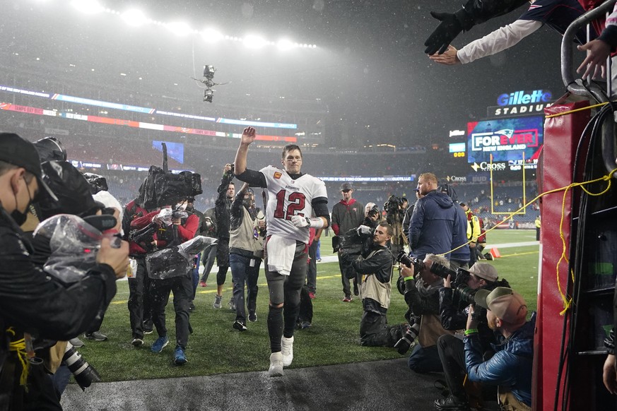 Tampa Bay Buccaneers quarterback Tom Brady (12) waves to fans after defeating the New England Patriots 19-17 in an NFL football game, Sunday, Oct. 3, 2021, in Foxborough, Mass. (AP Photo/Steven Senne)