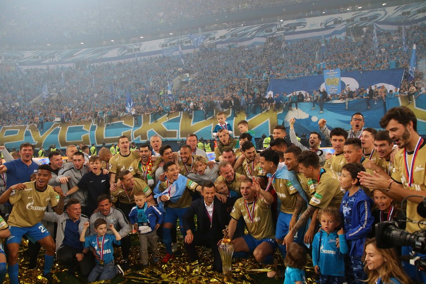 Russian Federation. St. Petersburg. Gazprom Arena. Football Club Zenith. Rewarding Zenit footballers with gold medals RPL and RPL Cup. Zenit was awarded the RPL champion cup. Zenit football club playe ...
