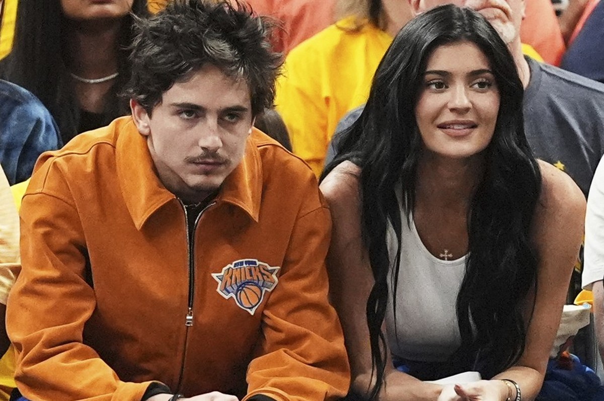 Timothee Chalamet, center left, and Kylie Jenner, center right, watch during the first half of Game 6 of the Eastern Conference finals of the NBA basketball playoffs between the New York Knicks and th ...