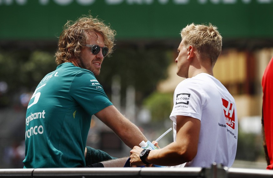 Sebastian Vettel, Aston Martin, speaks with Mick Schumacher, GP Monaco