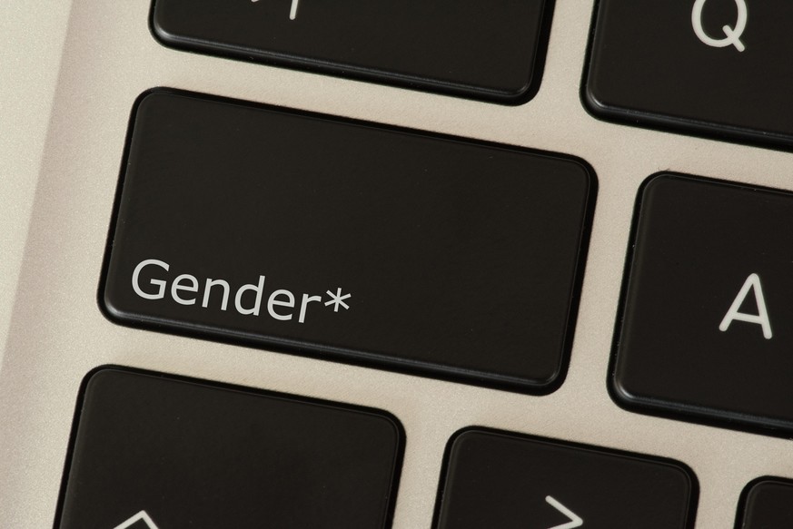 Ein Computer und Taste für Gender