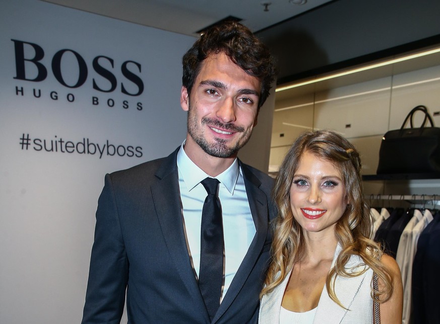 DUESSELDORF, GERMANY - APRIL 25: Mats Hummels and Cathy Hummels attend the Hugo Boss Store Event on April 25, 2016 in Duesseldorf, Germany. (Photo by Mathis Wienand/Getty Images)