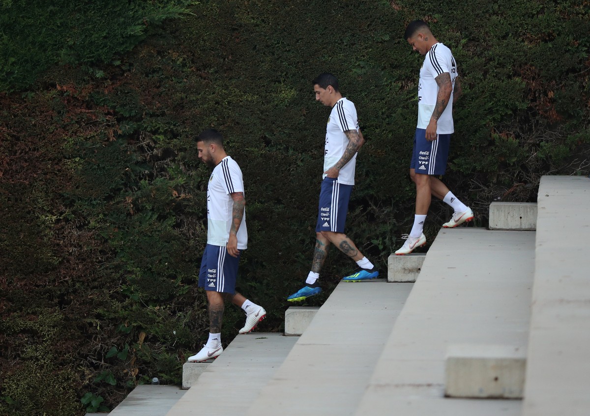 Soccer Football - FIFA World Cup - Argentina Training - Ciutat Esportiva Joan Gamper, Barcelona, Spain - June 6, 2018 Argentina&#039;s Nicolas Otamendi, Angel Di Maria and Marcos Rojo arrive for train ...