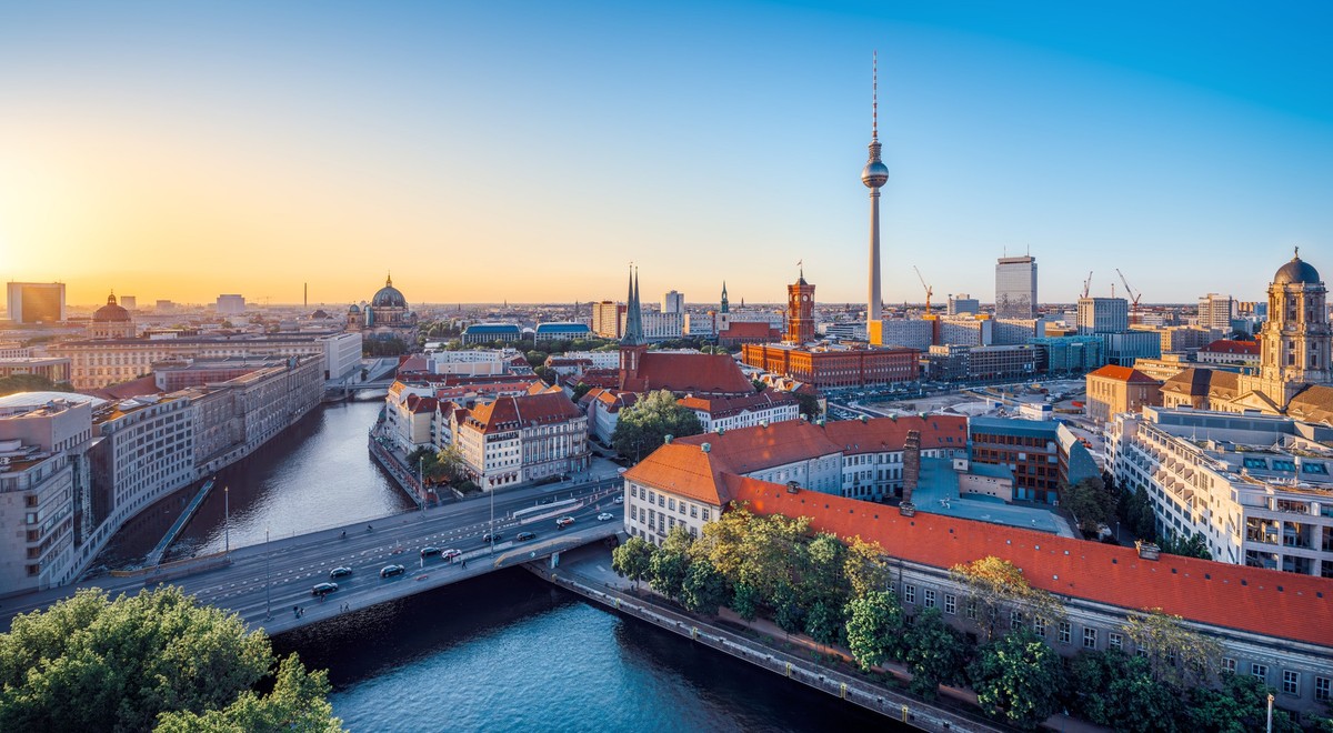the skyline of berlin during sunset