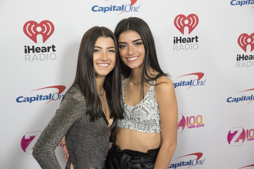 Charli D Amelio and Dixie D Amelio arrive at iHeartRadio s Z100 Jingle Ball 2019 at Madison Square Garden on December 13, 2019 in New York City, New York. USA - 2019 - iHeartRadio s Z100 Jingle Ball i ...