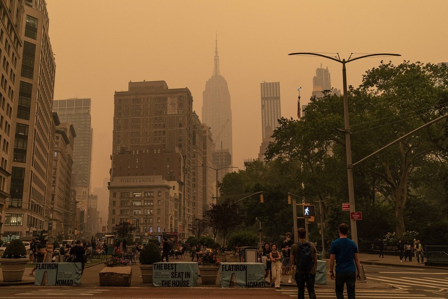 New York experiences worst air quality because of Canadian wildfires View of hazy New York city skylines during bad air quality because smoke of Canadian wildfires brought in by wind. Authorities urge ...