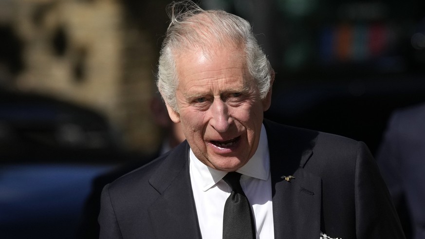 FILE - King Charles III arrives to thank emergency service workers for their work and support ahead of the funeral of Queen Elizabeth II at the Metropolitan Police Service Special Operations Room in L ...