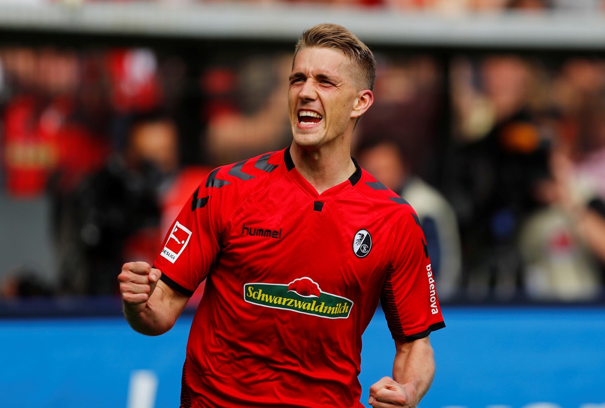 Soccer Football - Bundesliga - SC Freiburg v FC Cologne - Schwarzwald-Stadion, Freiburg, Germany - April 28, 2018 SC Freiburg's Nils Petersen celebrates scoring their second goal REUTERS/Kai Pfaf ...