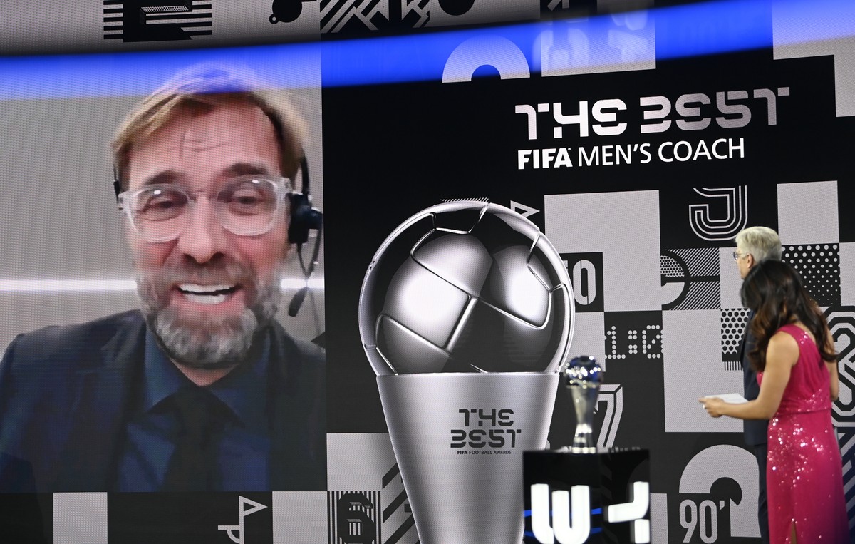 Liverpool's manager Jurgen Klopp smiles after being awarded as Men's coach of the year during the Best FIFA Football Awards Ceremony in Zurich, Switzerland, Thursday, Dec. 17, 2020. (Valeria ...