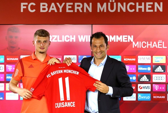 Soccer Football - Bayern Munich unveil Michael Cuisance - Saebener Strasse, Munich, Germany - August 20, 2019 Bayern Munich's Michael Cuisance and sporting director Hasan Salihamidzic pose with a shir ...