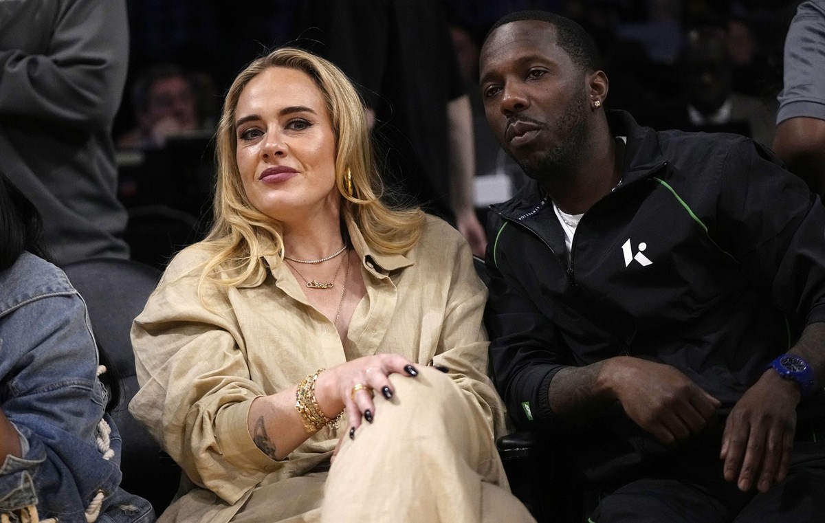 Singer Adele, left, sits with sports agent Rich Paul during the second half in Game 3 of an NBA basketball Western Conference semifinal between the Los Angeles Lakers and the Golden State Warriors Sat ...