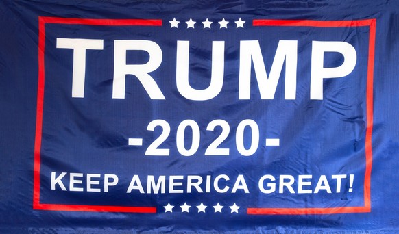 Trump flag for President 2020, keep America Great, presidential election, flag isolated on white background texture closeup