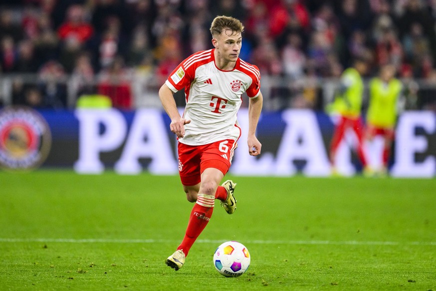 ARCHIV - 24.02.2024, Bayern, München: Fußball: Bundesliga, Bayern München - RB Leipzig, 23. Spieltag, Allianz Arena. Münchens Joshua Kimmich in Aktion. Er äußert sich zu Ralf Rangnick. (zu dpa: «Viel  ...