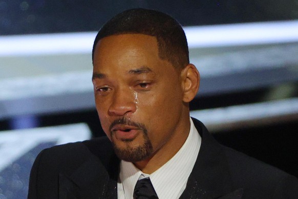 Will Smith cries as he accepts the Oscar for Best Actor in &quot;King Richard&quot; at the 94th Academy Awards in Hollywood, Los Angeles, California, U.S., March 27, 2022. REUTERS/Brian Snyder