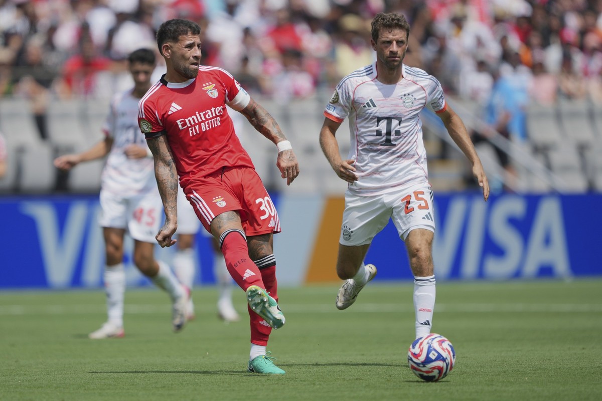 Benfica's Nicolas Otamendi kicks past Bayern Munich's Thomas Muller during the Club World Cup Group C soccer match between Benfica and Bayern Munich in Charlotte, N.C., Tuesday, June 24, 202 ...