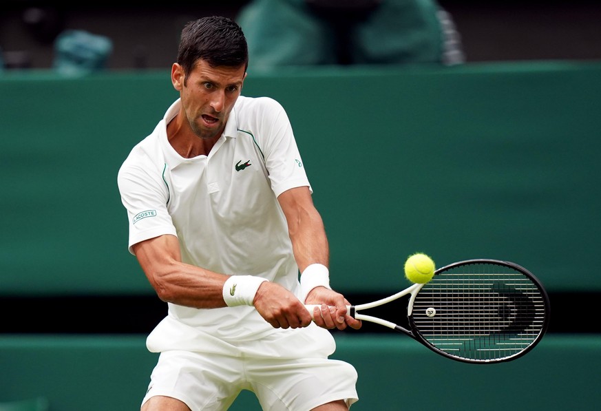 Wimbledon 2022 - Day One - All England Lawn Tennis and Croquet Club. Novak Djokovic in action against Soon Woo Kwon on day one of the 2022 Wimbledon Championships at the All England Lawn Tennis and Cr ...