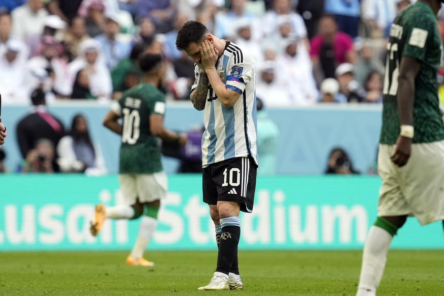 Argentina's Lionel Messi reacts disappointed during the World Cup group C soccer match between Argentina and Saudi Arabia at the Lusail Stadium in Lusail, Qatar, Tuesday, Nov. 22, 2022. (AP Photo/Nata ...