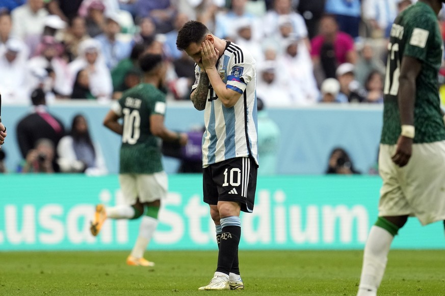 Argentina&#039;s Lionel Messi reacts disappointed during the World Cup group C soccer match between Argentina and Saudi Arabia at the Lusail Stadium in Lusail, Qatar, Tuesday, Nov. 22, 2022. (AP Photo ...