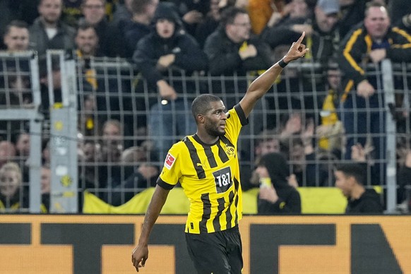 Dortmund's Anthony Modeste reacts after scoring his side's second goal during the German Bundesliga soccer match between Borussia Dortmund and Bayern Munich in Dortmund, Germany, Saturday, Oct. 8, 202 ...