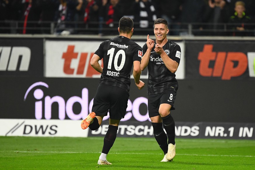 (181020) -- FRANKFURT, Oct. 20, 2018 -- Luka Jovic (R) of Frankfurt celebrates scoring during the Bundesliga match between Eintracht Frankfurt and Fortuna Duesseldorf at Commerzbank-Arena in Frankfurt ...