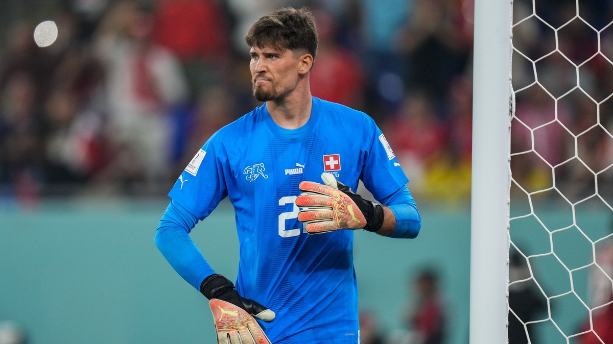 Switzerland's goalkeeper Gregor Kobel reacts after Serbia's Aleksandar Mitrovic scored his side's first goal during the World Cup group G soccer match between Serbia and Switzerland, at ...