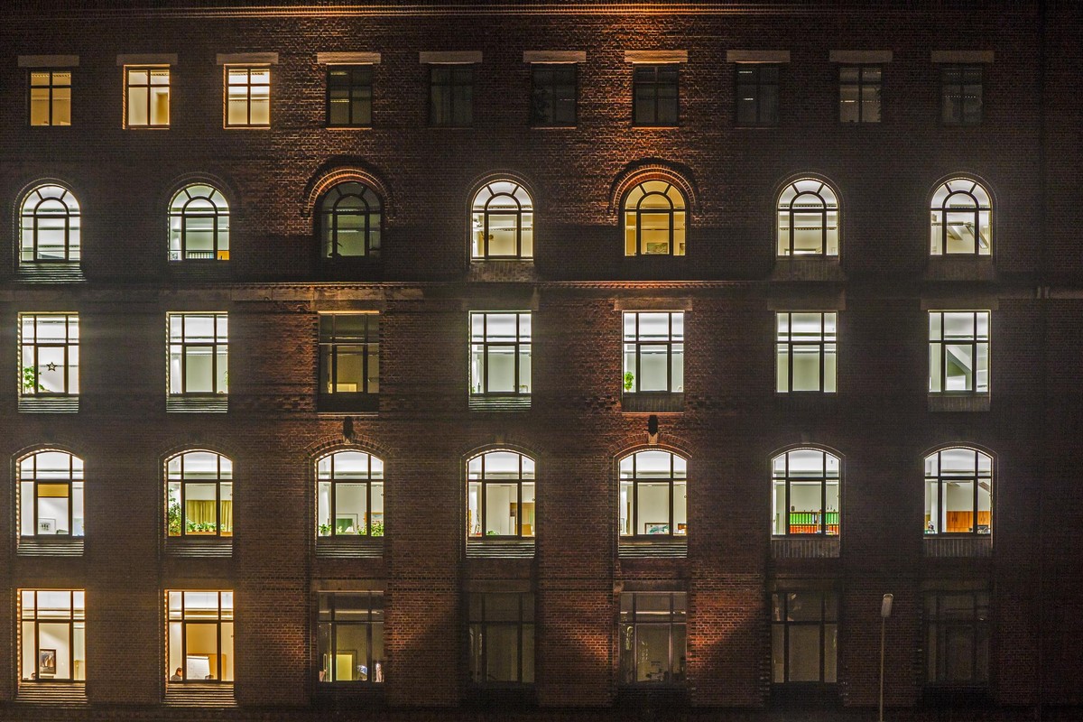 window of office buildings in historic Speicherstadt at night in Hamburg